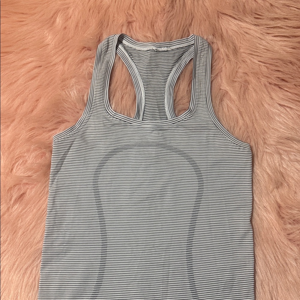 Lululemon Swiftly Tech Racerback Tank
Top 2.0 *Hip Length size 4 NWOT